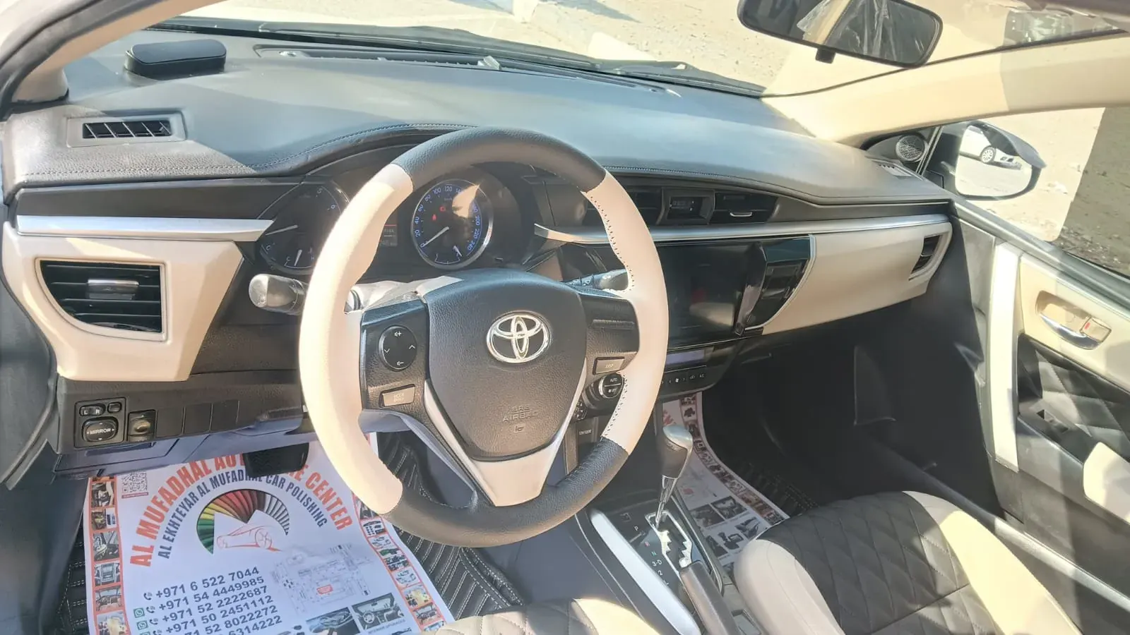 Two-tone custom Toyota Corolla dashboard and steering