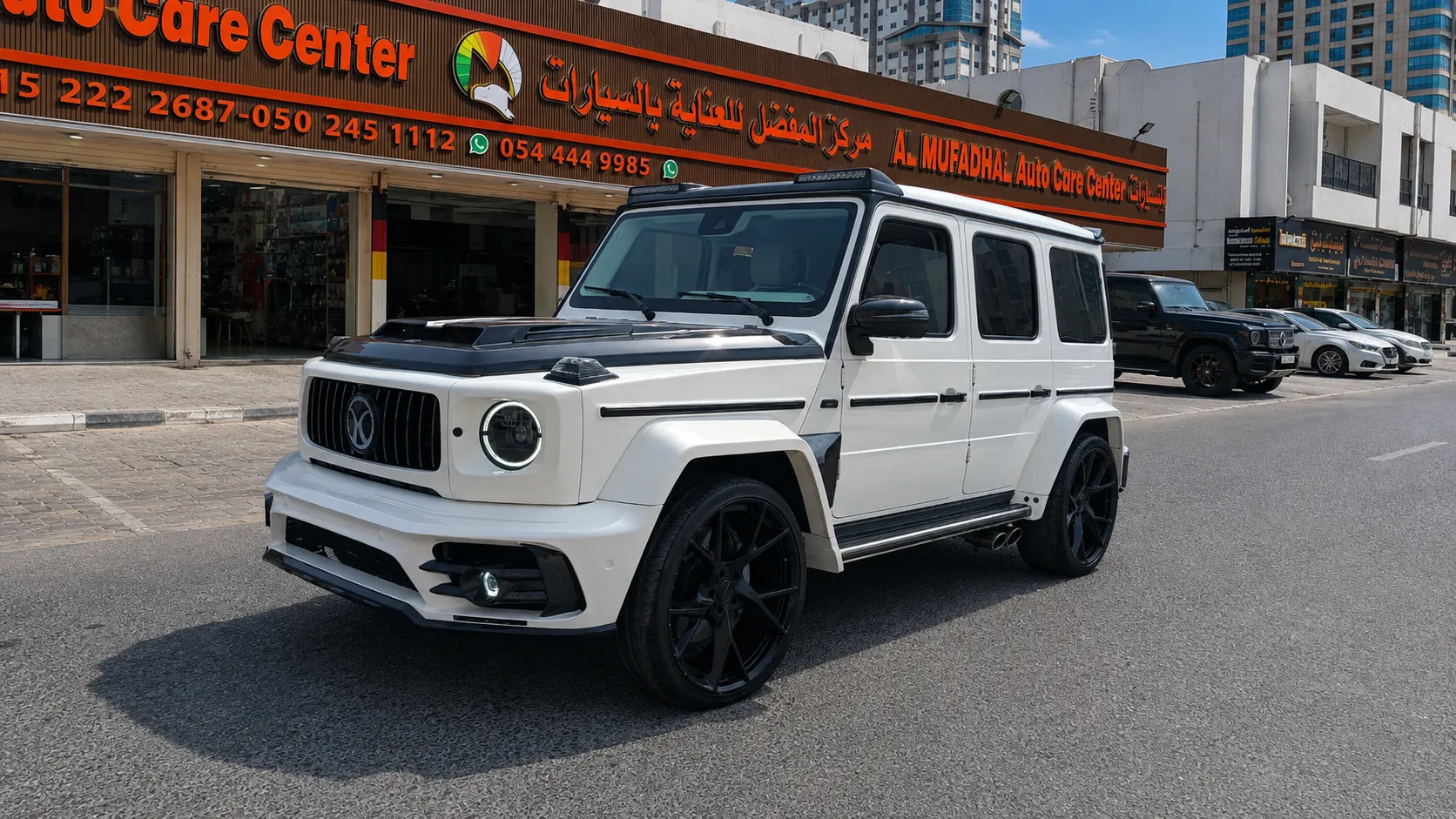 Finished white G-Class outside AL MUFADHAL Auto Care Center